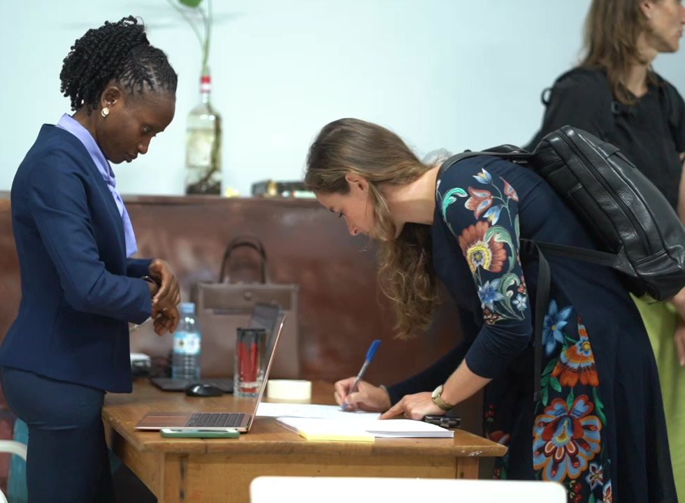 Participants signing in at the PADEO access to finance validation workshop facilitated by Quad Tee